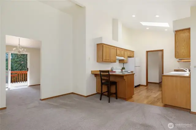 Kitchen with bar for a convenient meal. The Family Room is just waiting for your creative touch.