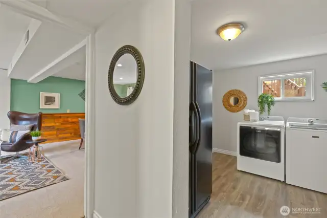 Downstairs utililty room and bonus room are same square footage as open living area upstairs. With direct access to garage, this offers ADU and multigenerational living with stairless entry.