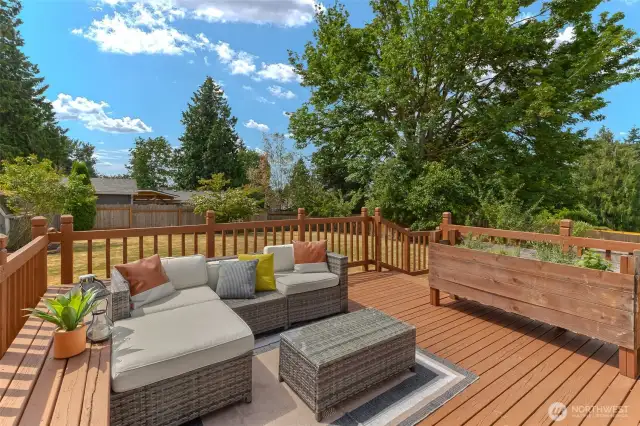 Back deck with access to yard off of dining room.