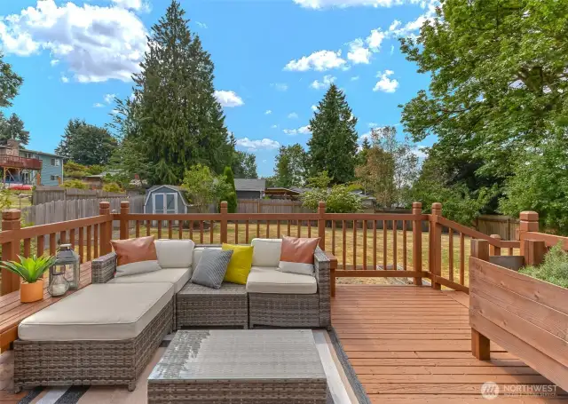 Back deck with access to yard off of dining room.
