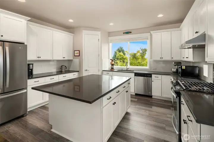There is storage galore, including a walk-in pantry and lower cabinet slide-outs for easy access.