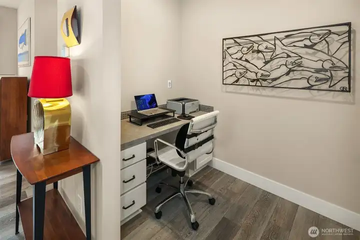 This main living area office alcove is perfect for getting a little work done or - transform it into additional storage or a wine nook.