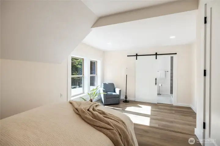 Large Primary Bedroom upstairs with two closets. New barn door to primary bathroom.