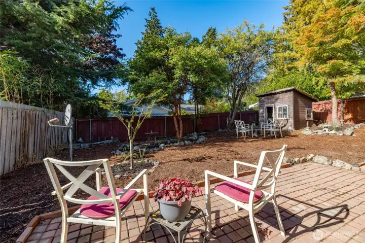Backyard is fenced on 3 sides but not enclosed on the sides leading to the front yard. So, a few feet of fencing is needed on both sides of the home to enclose the back yard.
