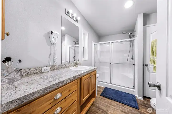 Guest bathroom right outside of their bedroom.