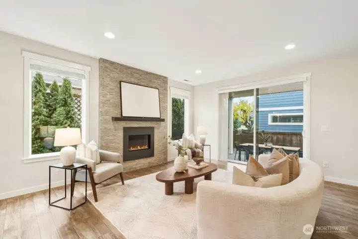 Floor to ceiling designer fireplace face and mantle