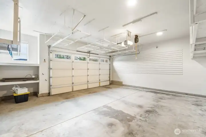 Large 2- car garage with tons of extra storage and built in storage systems
