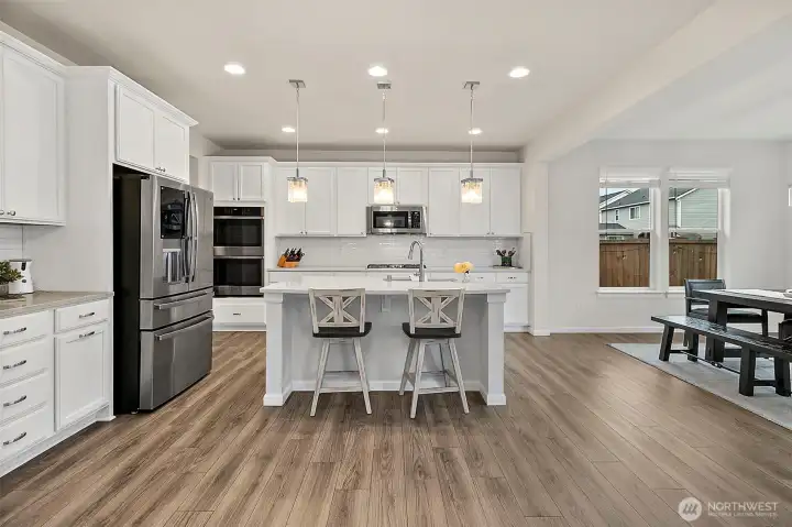 Perfect kitchen layout for cooking, hosting, and entertaining.