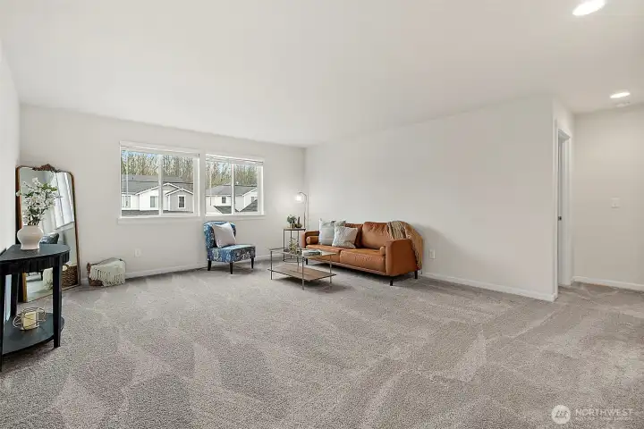 Bonus room upstairs for media, play, office, or workout space.