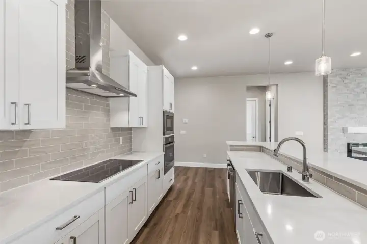 Photos are of another Harris plan- finishes will vary.