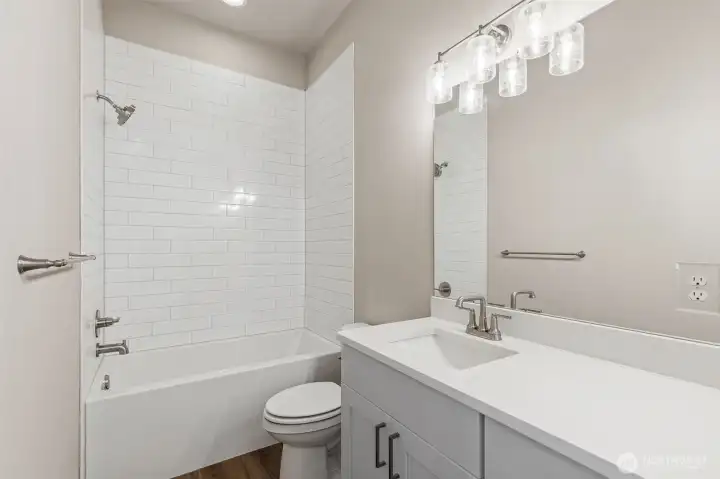 Photos are of another Harris plan- finishes will vary.