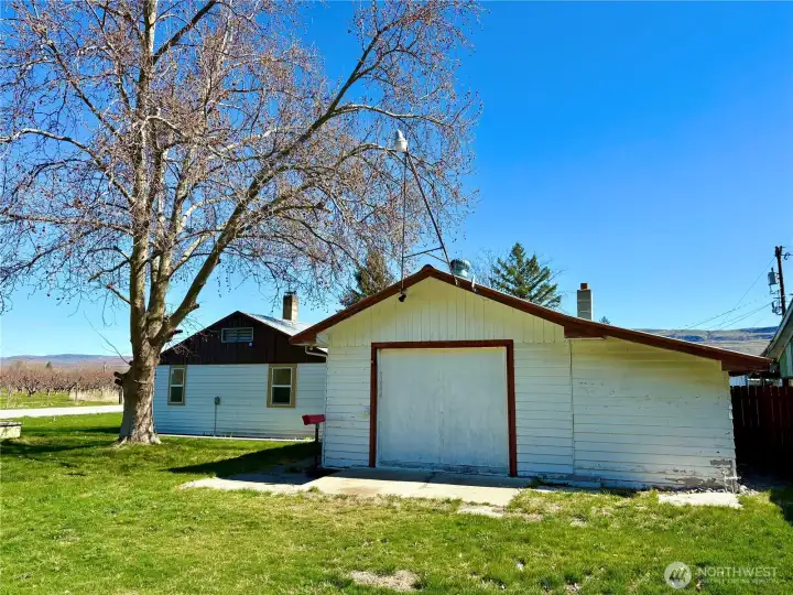 Garage with Laundry and Storage/Pantry