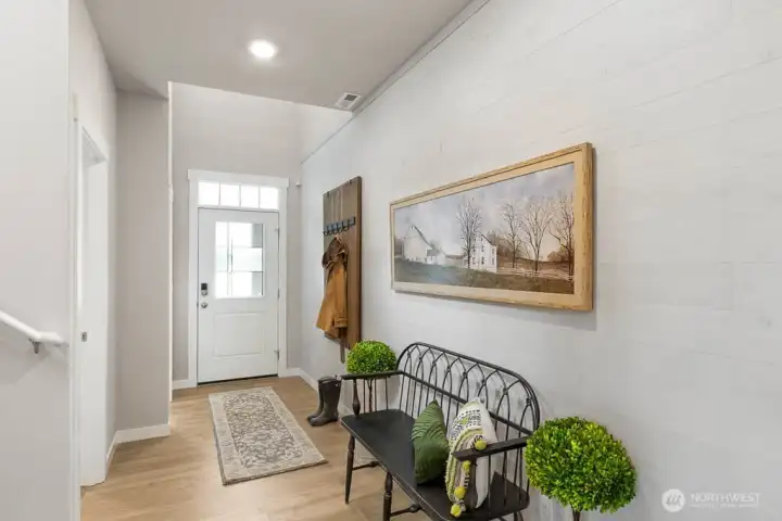 light and bright open to above entry. Photo's are for representational purposes only. Colors and finishes may differ.