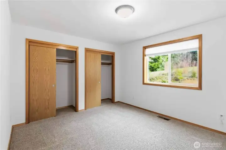Additional bedroom with two closets.