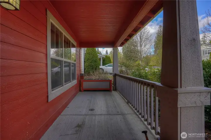 Relax and unwind on your covered front porch—an inviting space that truly makes this house feel like home.