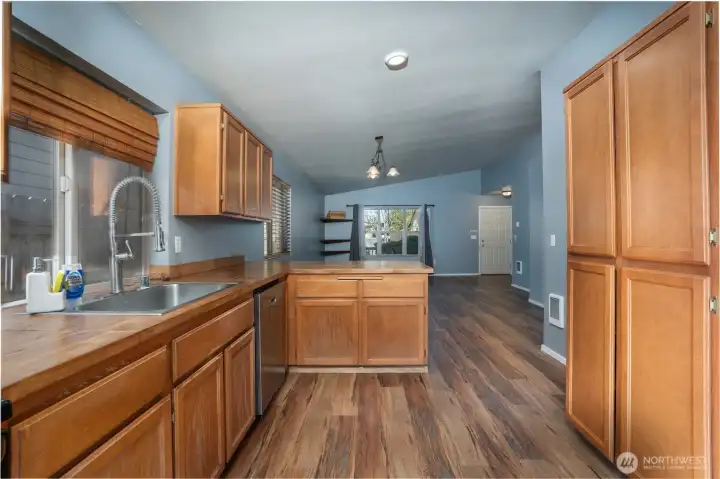 Open-concept design connects kitchen and living spaces, perfect for gathering, entertaining, and everyday life.