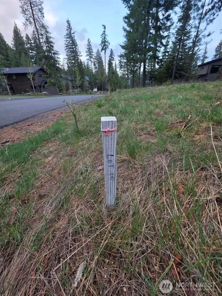 Lot 15 is shown on survey stake in the front of the lot. Makes it easy to indicate which lot it is.