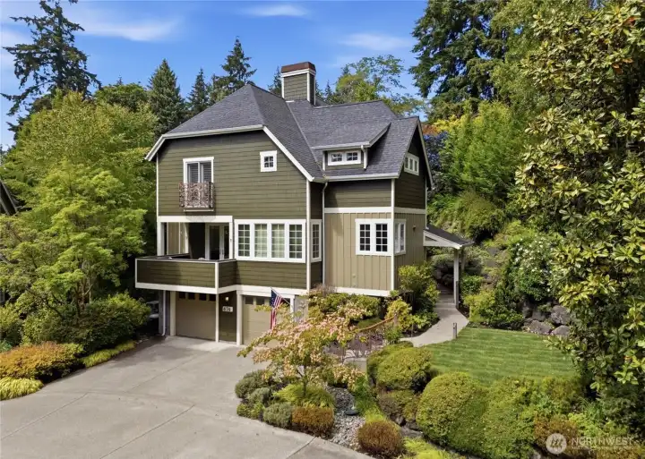 A beautiful and gracious home, newly painted and with new sod and mature manicured landscaping.