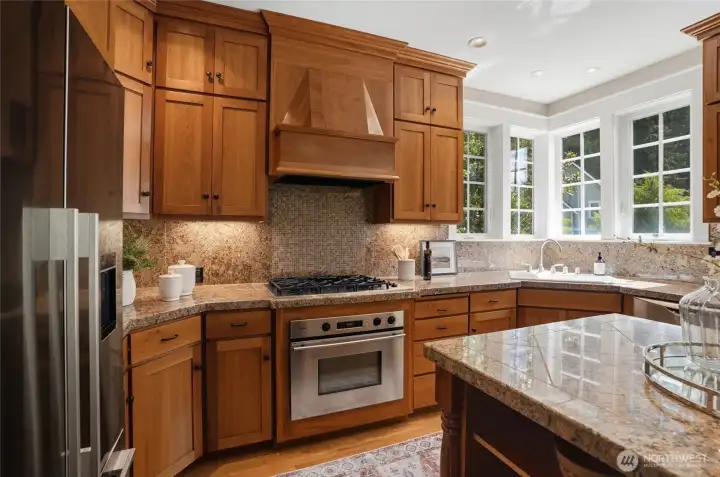 Cherry cabinets and granite counters in the chef's kitchen. All appliances are top quality.