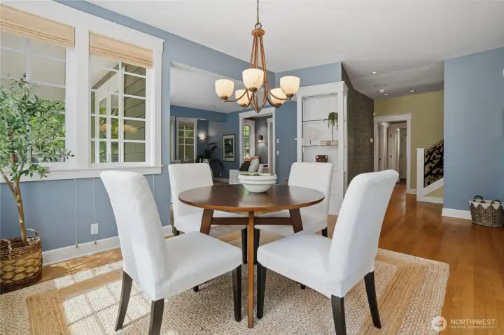 Dinette alcove and lighted etagere leading to the formal living room and dining room.