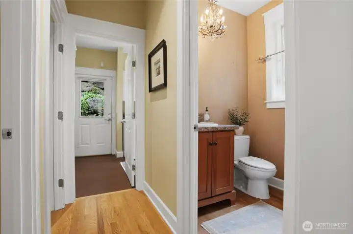 Main level powder room and hall leading to the laundry/mud room.