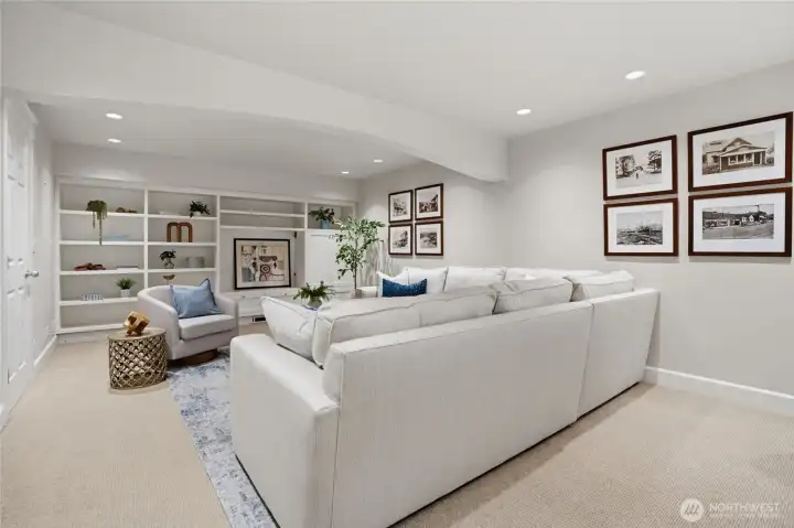 The lower level den/entertainment/office space. The framed historic images are of Winslow, Port Blakely, Rolling Bay, Eagle Harbor.