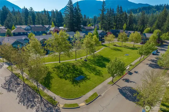 Surrounded by open space and greenery.