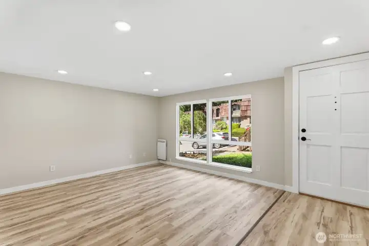 Entryway opens to the bright, oversized living room.