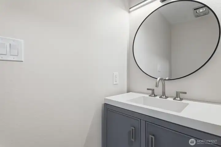 Main floor 1/2 bath is just off the kitchen - no sharing a bathroom with your guests.