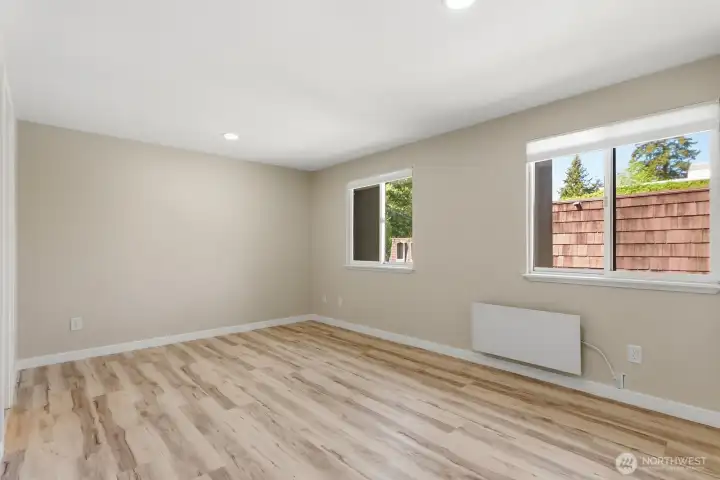 Upper primary bedroom with new, low-profile wall heaters.