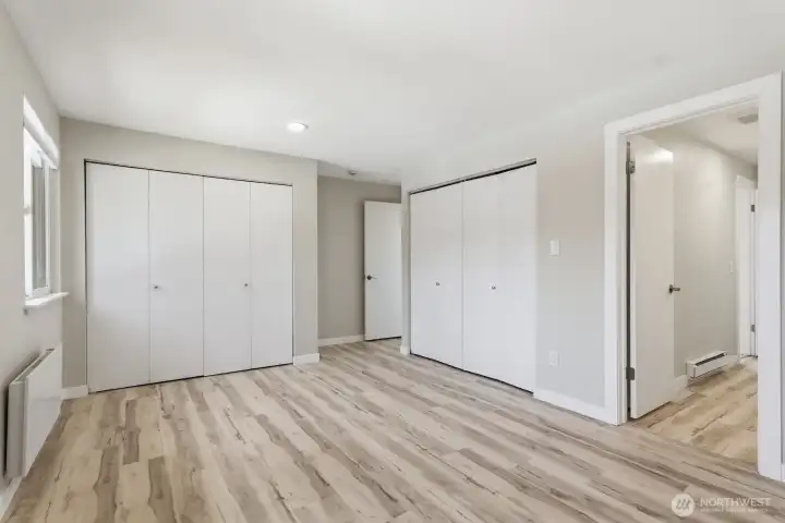Upper primary bedroom has 2 large double closets, providing plenty of storage space.