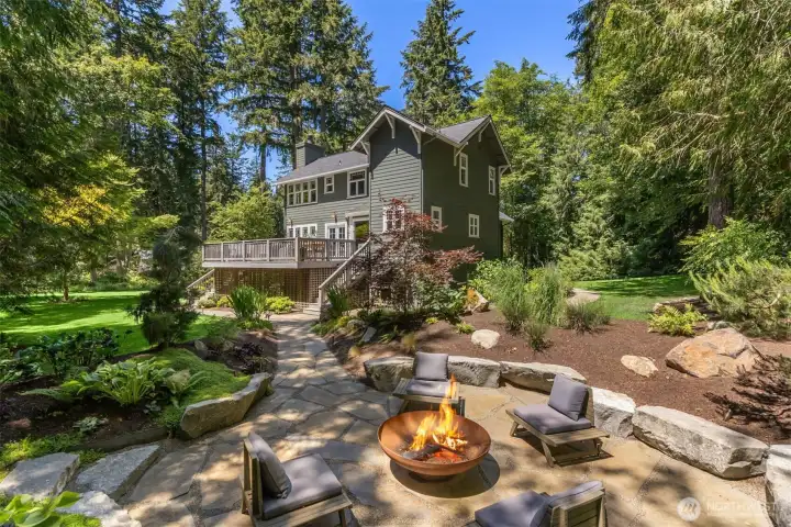 Situated on an expansive private lot with exceptional outdoor living spaces featuring a custom built fire pit and a spacious deck - perfect for entertaining, relaxing, and enjoying memorable conversations.