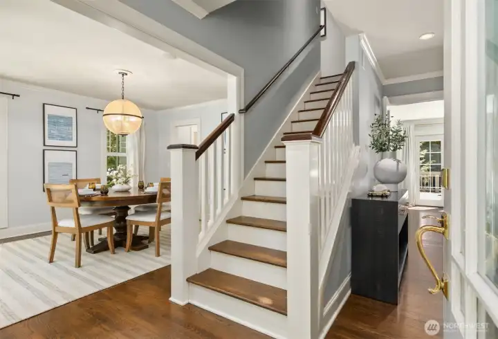 Upon entry the home unfolds with timeless elegance.  Featuring a formal dining room to the left and a refined parlor or private office to the right.  Creating a sophisticated and welcoming first impression.