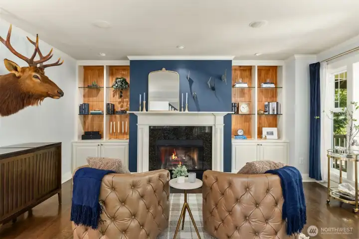 Elegant and versatile, this refined parlor offers the perfect setting for a private office, library, or intimate sitting room.  Custom built-ins and fireplace create a warm sophisticated atmoshphere ideal for both productivity and relaxation.