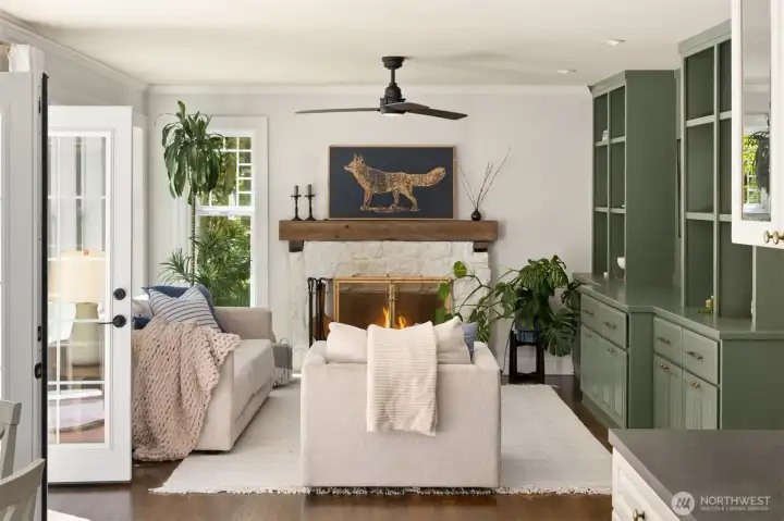 The living room flows effortlessly to the large deck, creating effortless indoor - outdoor living.