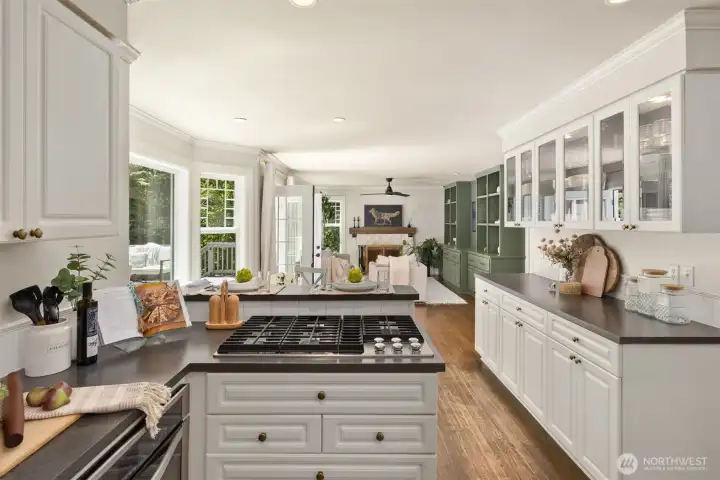 Open concept of kitchen, breakfast nook, and living room.