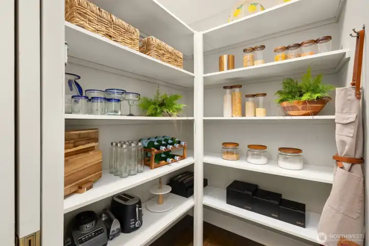 Spacious walk in pantry.