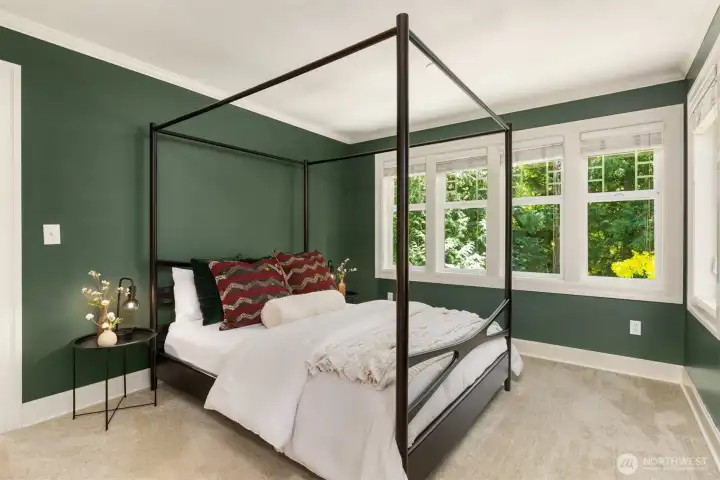 Bedroom two feels like you are living in the trees with beautiful views of the landscaping.