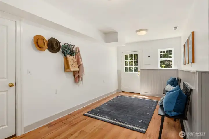 Ground floor entry with garage door on the left