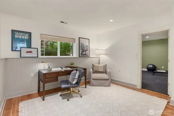 Flexible living options on the ground floor.  Perfect as an in-home office, guest space, and or gym