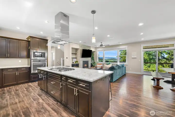 Open floor plan in the main living area encourages gathering around the kitchen. Perfect for entertaining!