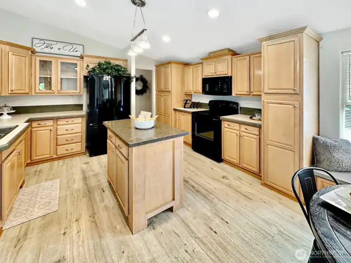 Another kitchen view...notice the glass front display cabinets.