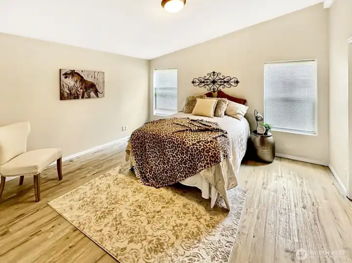 You will love the primary bedroom with laminate floor, two separate closets, vaulted ceiling and private 3/4 bath.