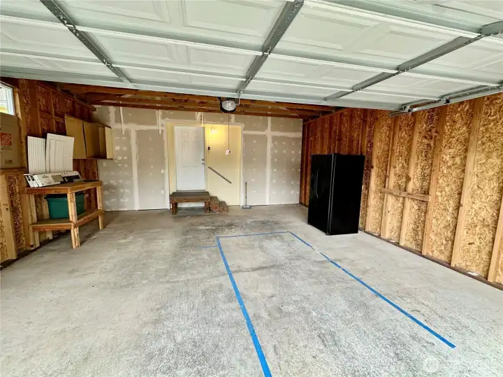 2 car garage with electric door opener.
