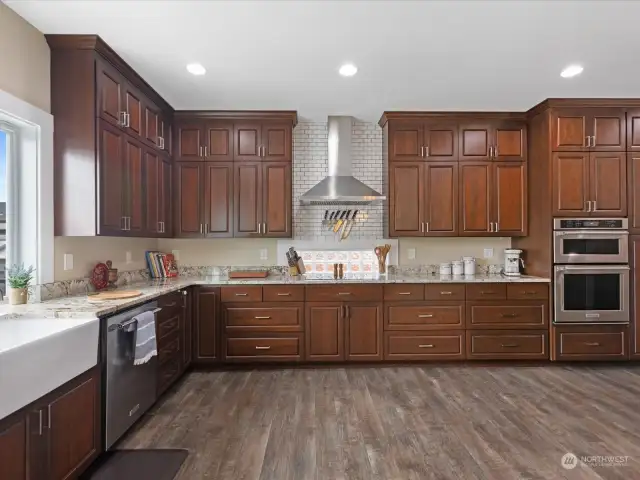 Beautiful open Kitchen is spacious - with stainless appliances, lots of counter space & easy-glide cabinets.