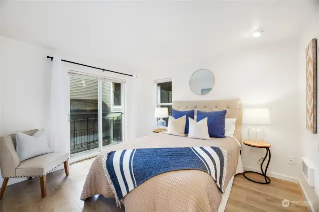 Your primary suite features a balcony, walk-in closet, and full bath with a linen closet.