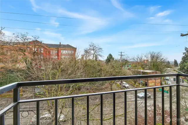 Enjoy territorial and downtown views from the living room balcony.