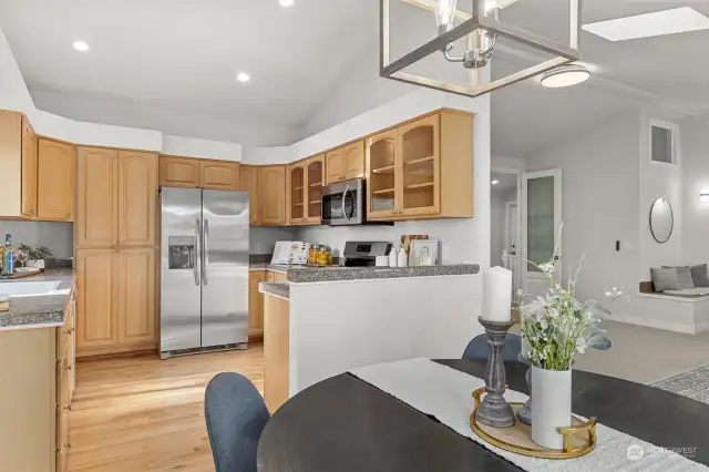 Main Floor Kitchen with all new appliances and refreshed Hardwoods.