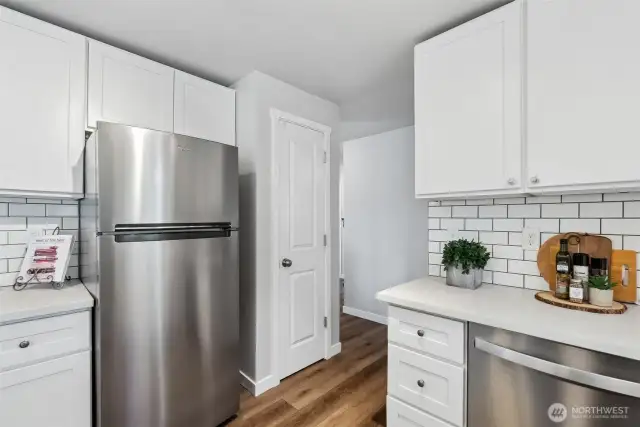 Stainless appliances, pantry, coffee counter