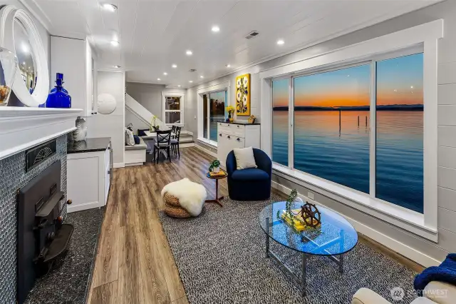 At golden hour, the living room becomes a private cinema—framing a moving masterpiece of sea, sky, and silhouette. Whether curled up fireside or sharing a meal in the dining nook, you’re always immersed in the rhythm of the Sound.
